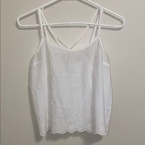 White Hollister tank top with designs.
